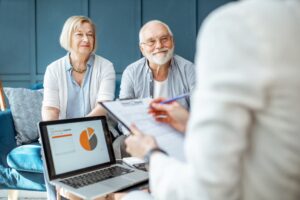 An old couple meets with a financial advisor.